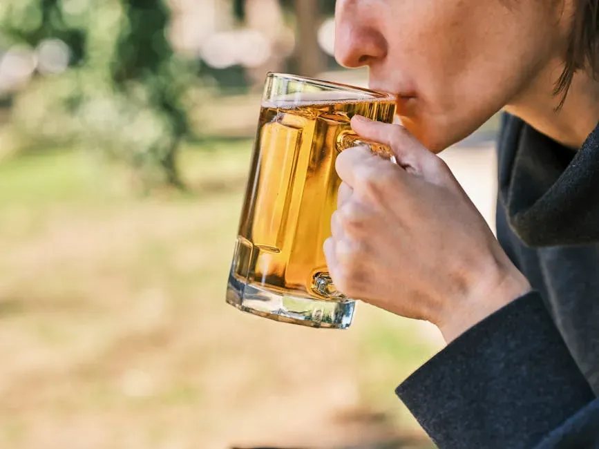 The Round-Buyer Who Downs Theirs First (Image Credits: Pexels)