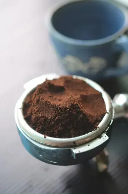 3. Spreading Coffee Grounds to Acidify Soil (Image Credits: Pexels)
