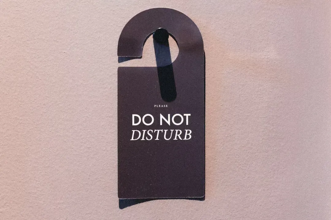 3. The "Do Not Disturb" Sign Tells a Story of Its Own (Image Credits: Unsplash)