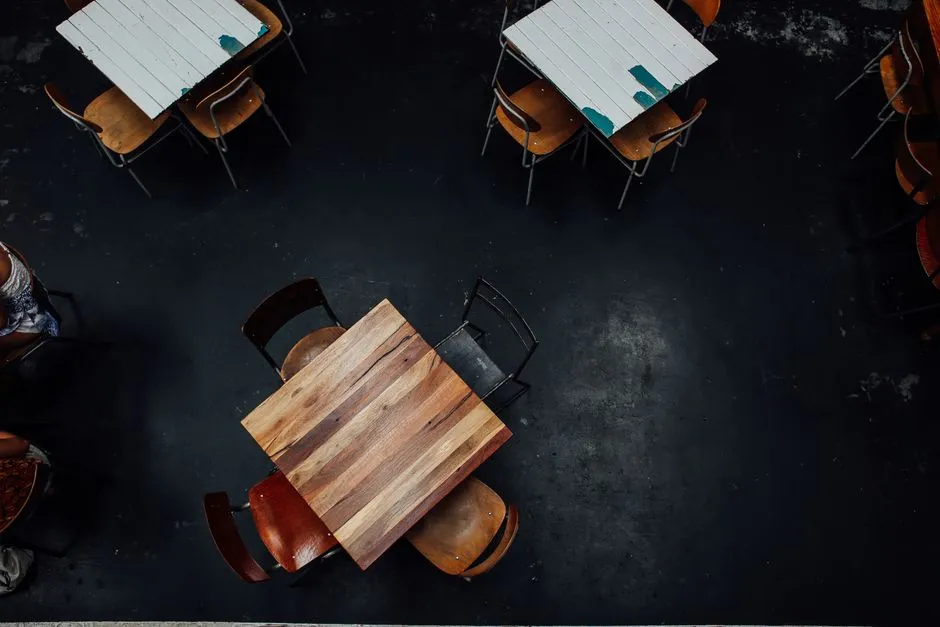 Letting the Host Sit in the Wrong Spot (Image Credits: Pexels)