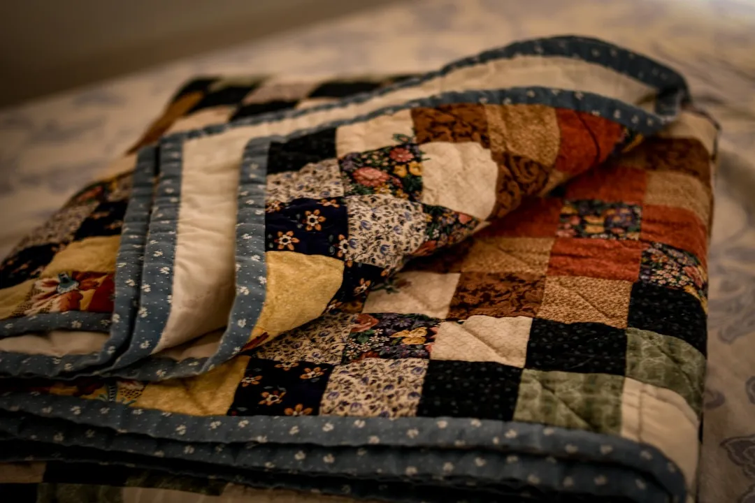 7. Vintage Quilts and Antique Textiles: Cottage Core Drives Real Demand (Image Credits: Unsplash)