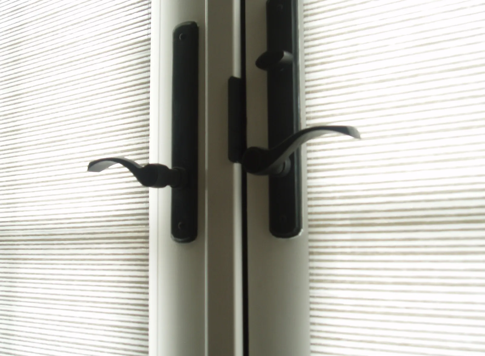 Lever-Style Door Handles Swapped Back for Round Knobs (windows, doors and handles, CC BY 2.0)