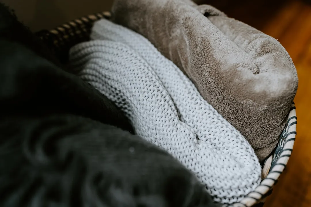 6. Electric Blankets Folded and Stored Under Heavy Items (Image Credits: Unsplash)