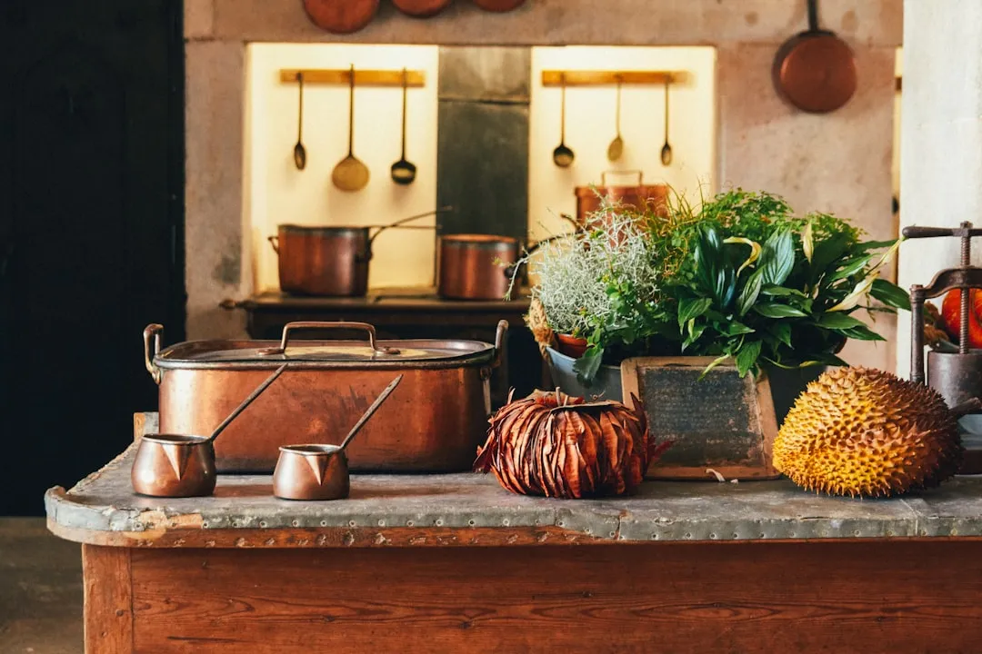 4. Antique Copper Cookware (Image Credits: Unsplash)
