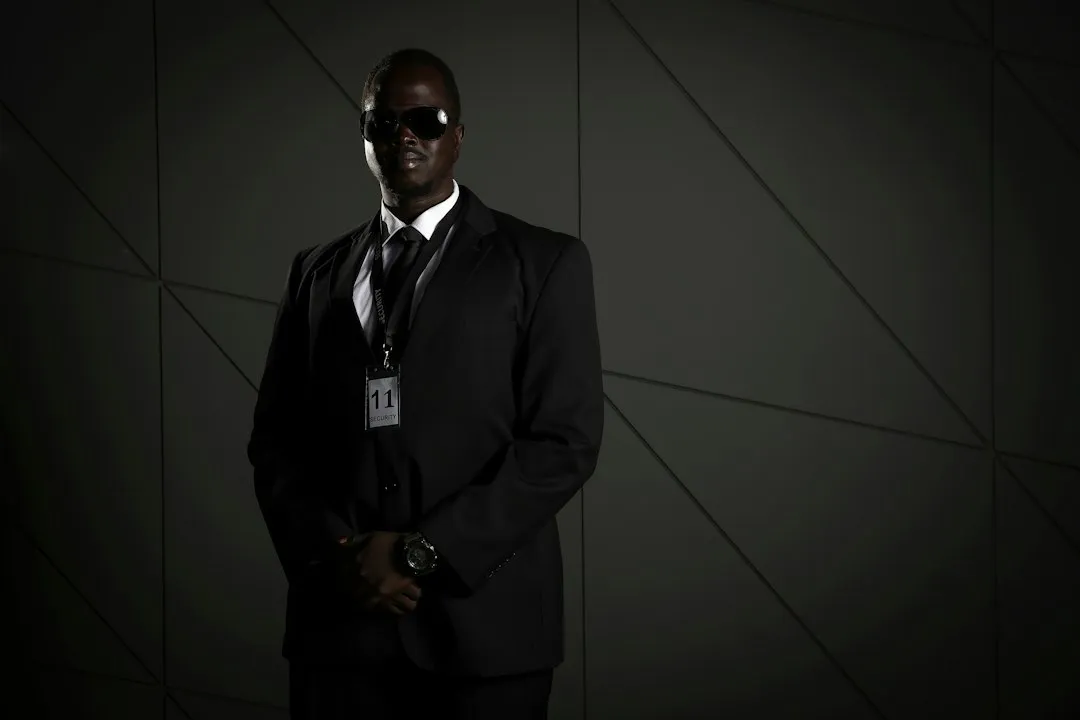 6. The Men in Black Agent: White Button-Up, Black Tie, Sunglasses (Image Credits: Unsplash)