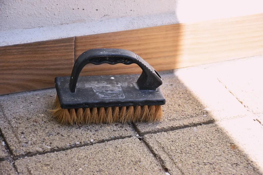 Scrubbing With Abrasive Brushes or Pads (Image Credits: Unsplash)