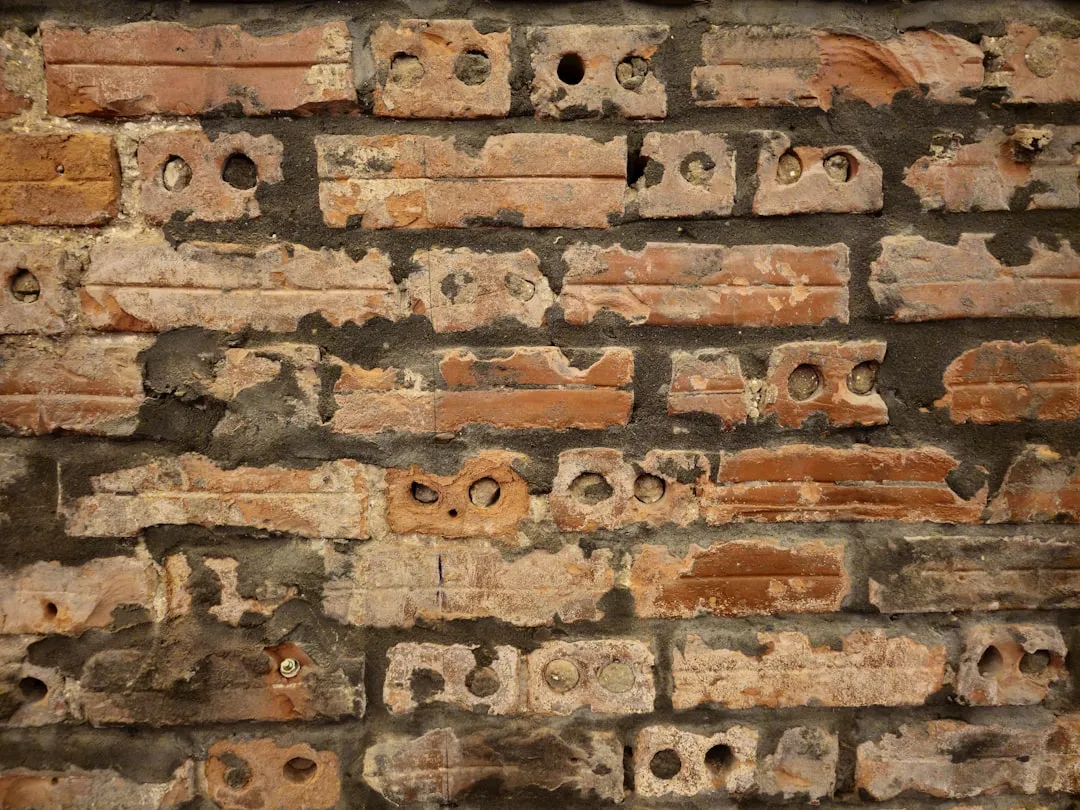 3. Weep Holes and Brick Veneer Gaps (Image Credits: Unsplash)