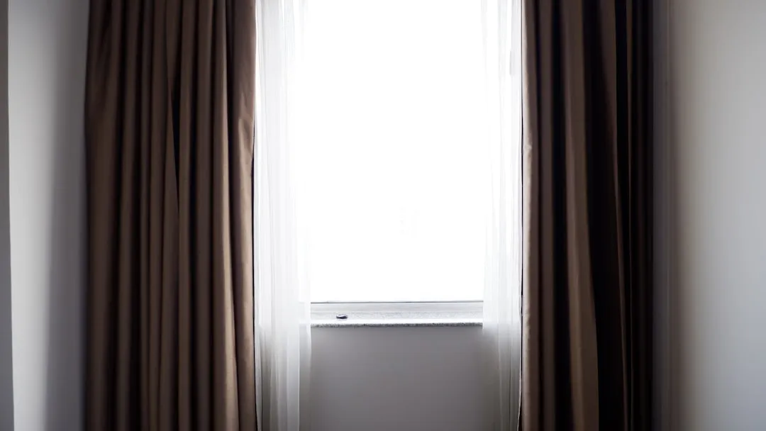 Why Heavy Curtains Blocked More Than Just Sunlight (Image Credits: Unsplash)