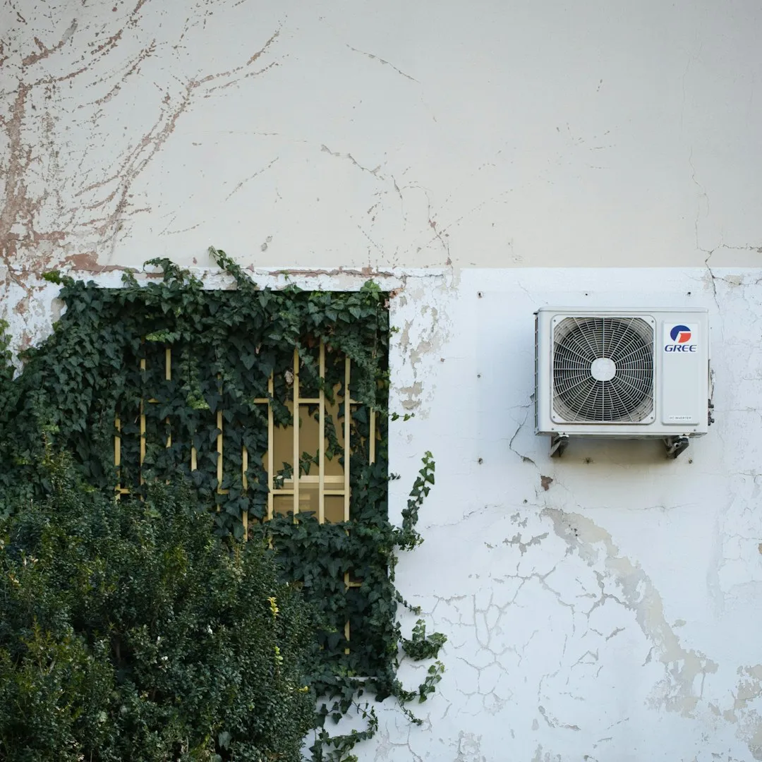 Leaving Windows Open While Running the Air Conditioning (Image Credits: Unsplash)