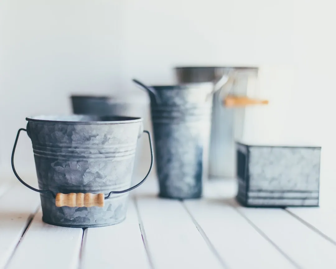The Iconic Ribbed Tin Pail Form (Image Credits: Unsplash)