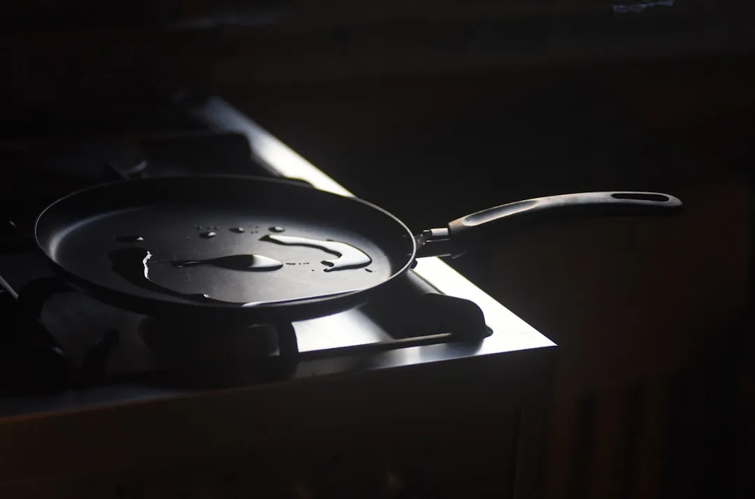 1. Running a Hot Pan Under Cold Water (Image Credits: Unsplash)