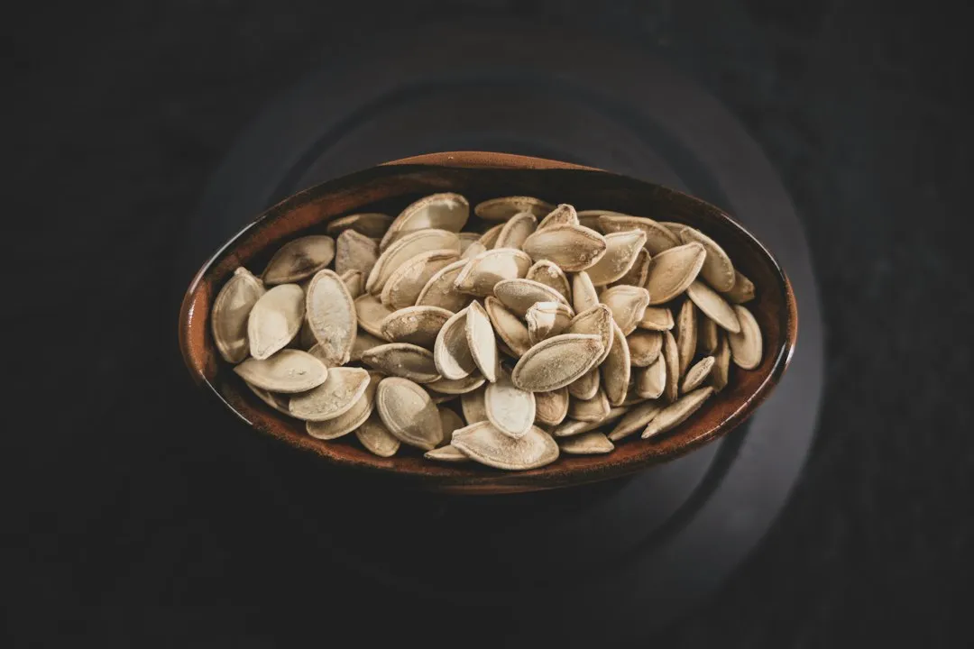 Freshly Scooped Seeds Hold Far More Moisture Than You Think (Image Credits: Unsplash)