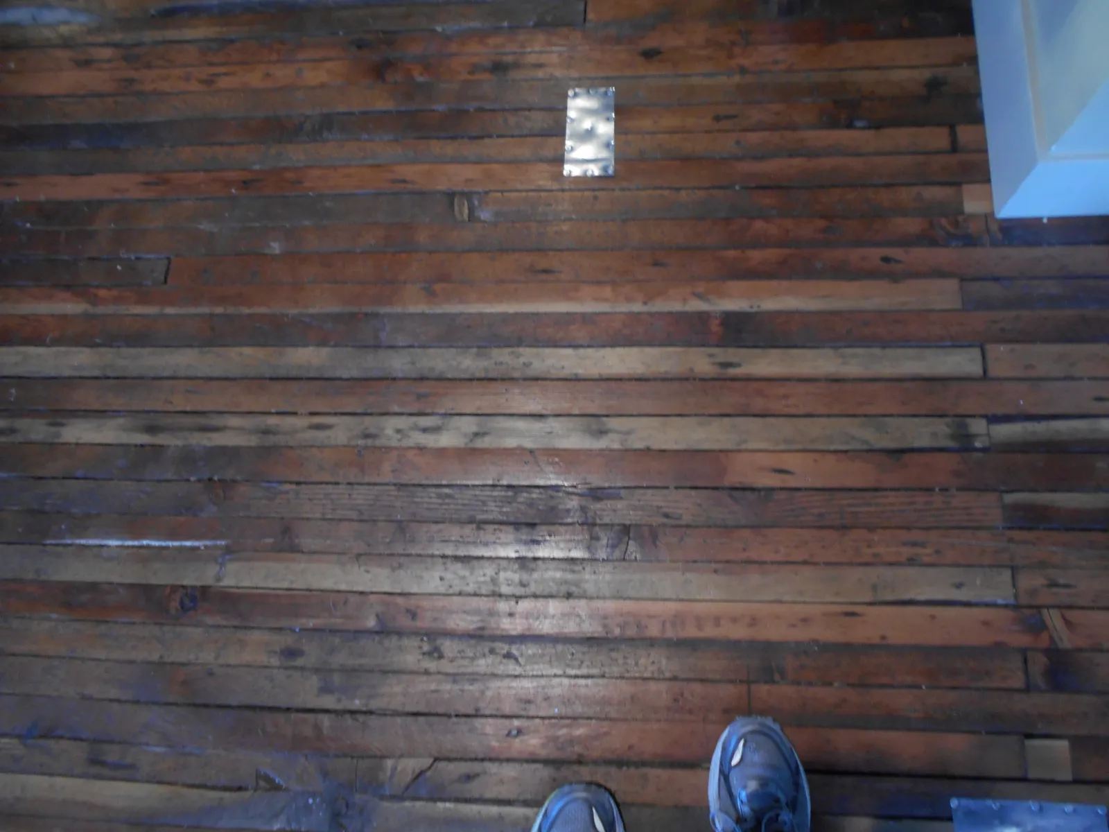 What You Can Actually Do About It (Preserved floorboards in old Lynden Department Store building restoration, CC BY 2.0)