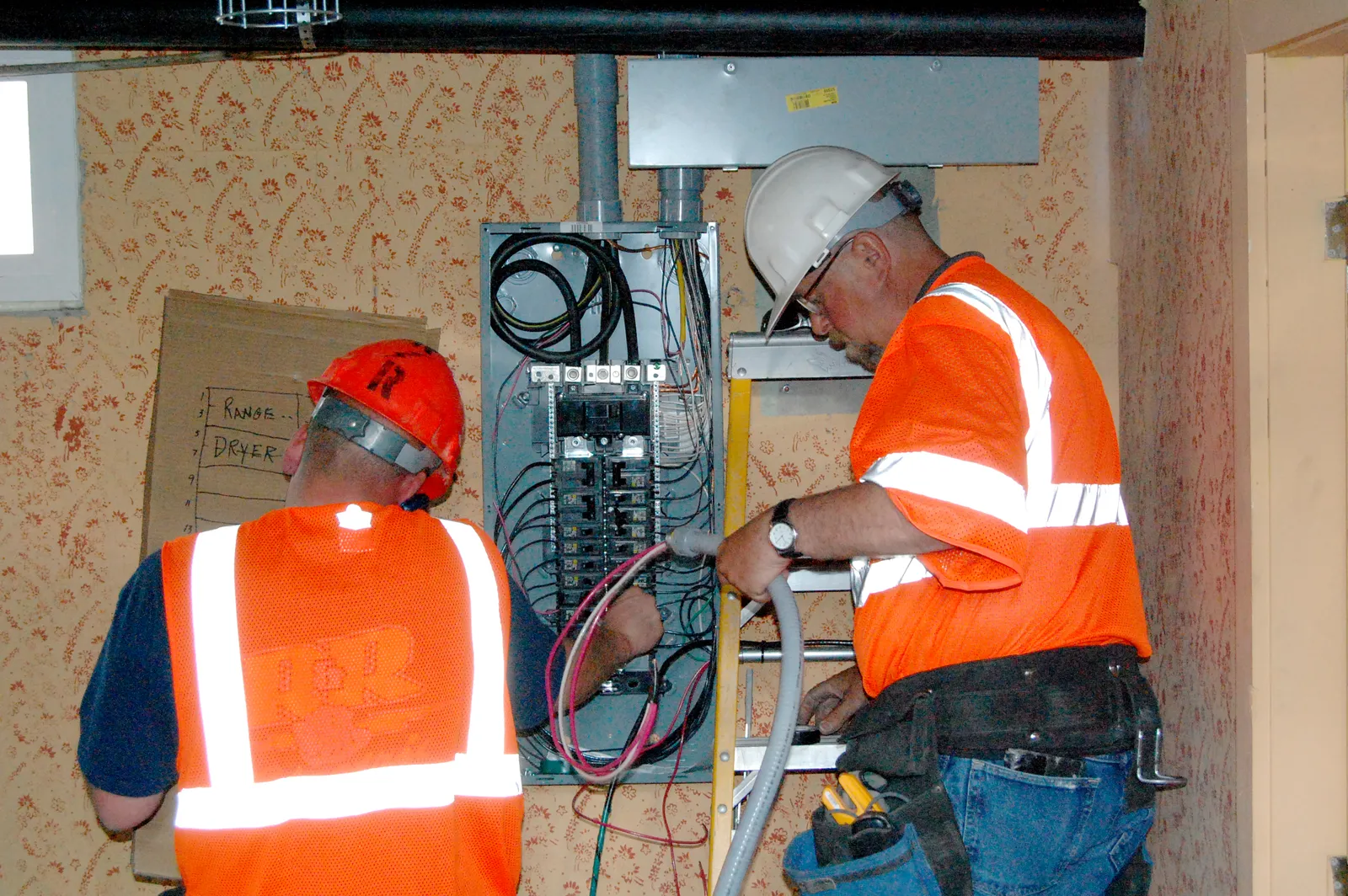Heat Stress That Compounds Over Decades (Flickr: Camas Quarters 2 electrical refit (Recovery Act), CC BY 2.0)