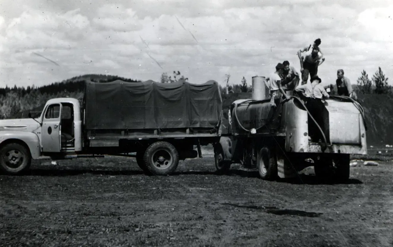 #10 - DDT Trucks Rolling Through Neighbourhoods While Kids Ran Through the Chemical Clouds (1948. Mixing DDT spray in Central Aircraft's tank-mixing truck. Western spruce budworm control project. Kinzua area, Oregon., Public domain)