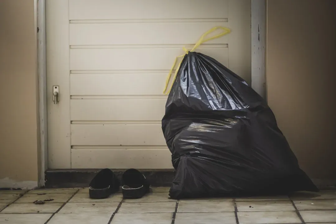 2. Consolidate Your Trash Into One Bag or Bin (Image Credits: Unsplash)