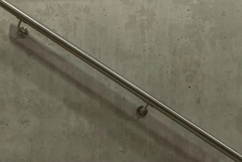 #3 - Checking Handrail Anchoring Into Wall Studs (Not Just Drywall) (Image Credits: Pexels)