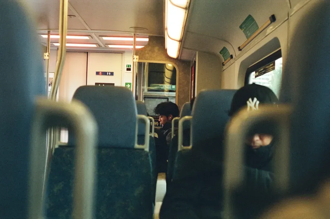 10. Treating the Train Like a Private Space (Image Credits: Unsplash)