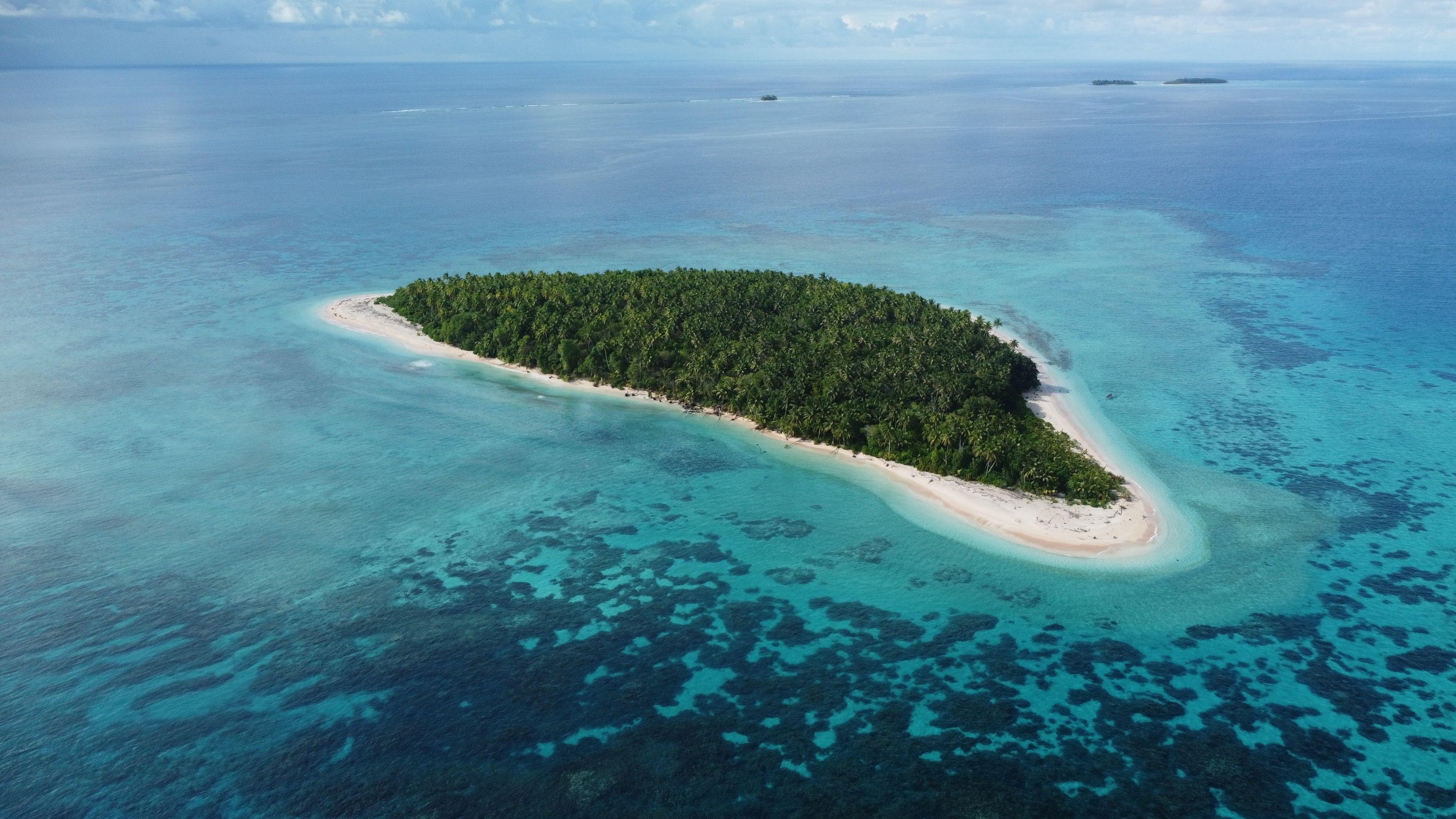 Tuvalu - Traditional Outrigger Canoe Sailing (Image Credits: Shutterstock)