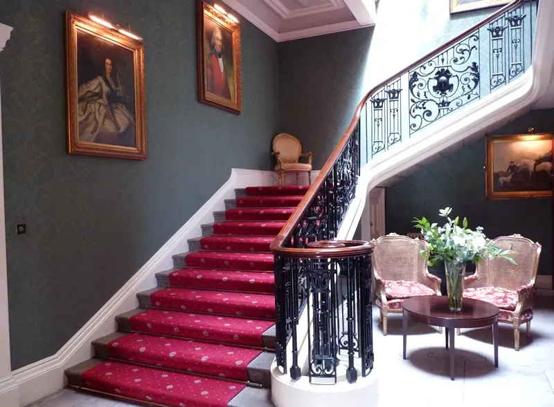 #2 - Staircases With Only One Handrail - or None at All (By Addington Palace, CC BY-SA 3.0)