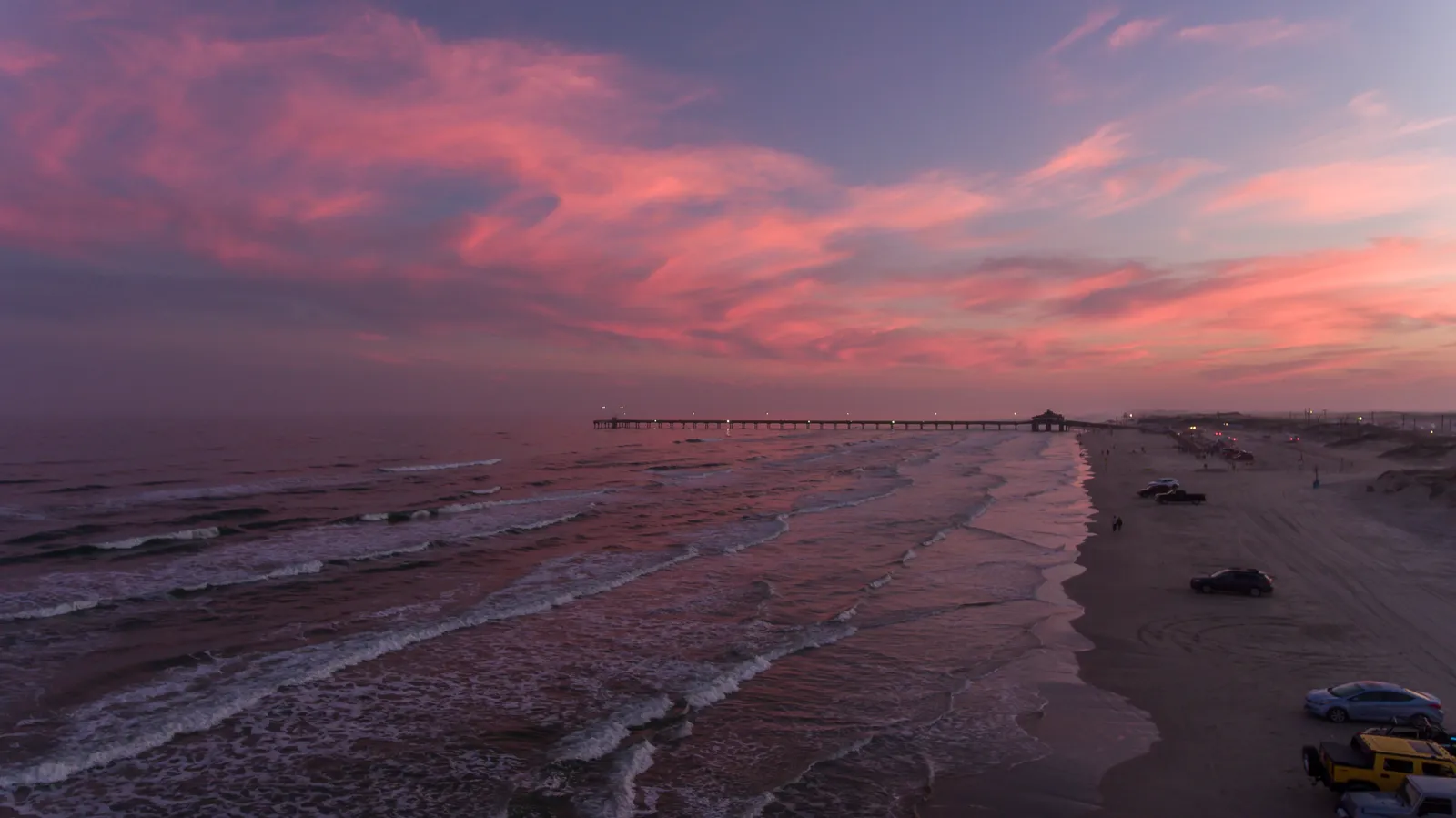 South Padre Island: Texas's Only Truly Tropical Island (An aerial view of South Padre Island with people parked and driving on the beach at sunset Own work, CC BY-SA 4.0)
