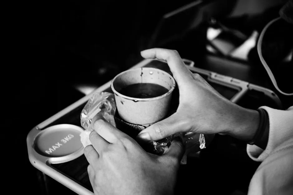 The Latte Seeker in Economy: The Optimistic Passenger (Image Credits: Pexels)