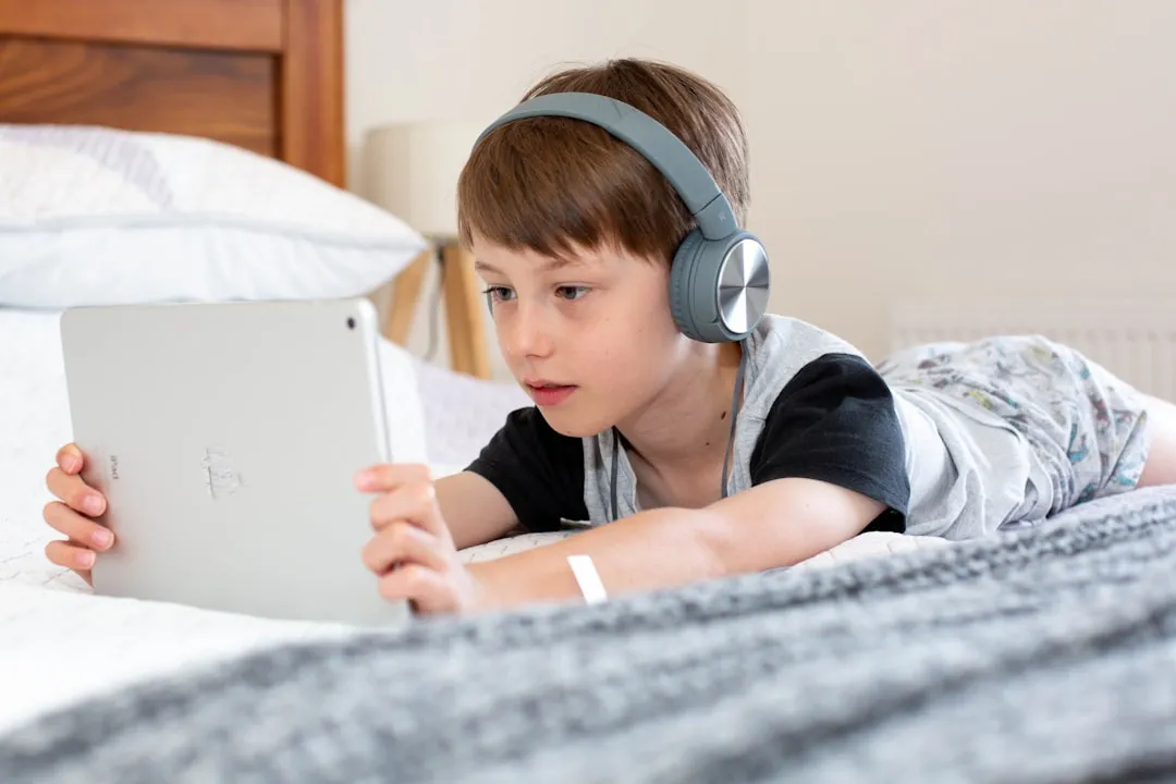A Downloaded Tablet with Child-Friendly Headphones (Image Credits: Unsplash)