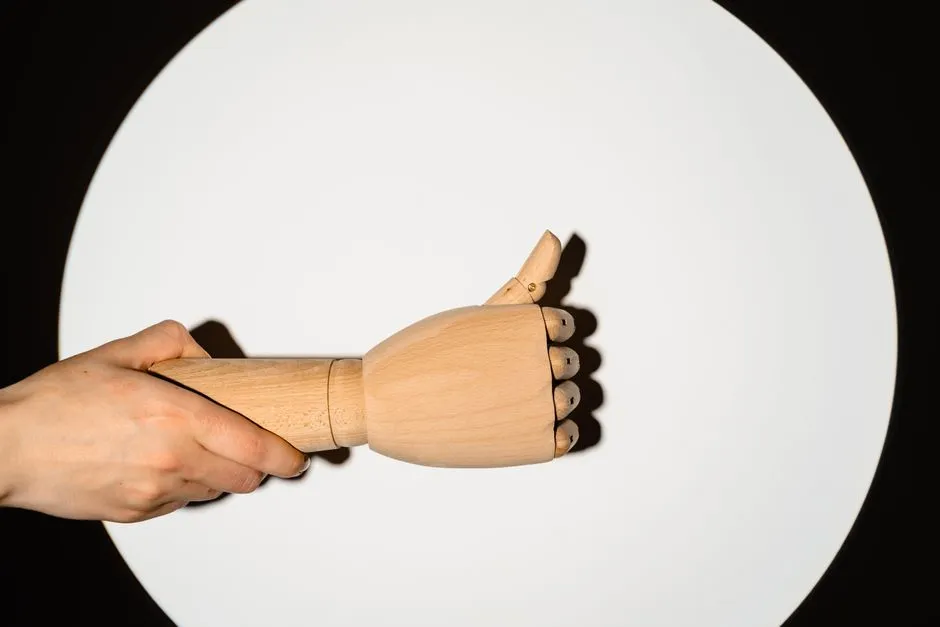 The Thumbs-Up: Not Always a Good Sign (Image Credits: Pexels)