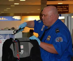 2. Clothing and Jackets Left at Security Lanes (By Transport Security Administration, Public domain)