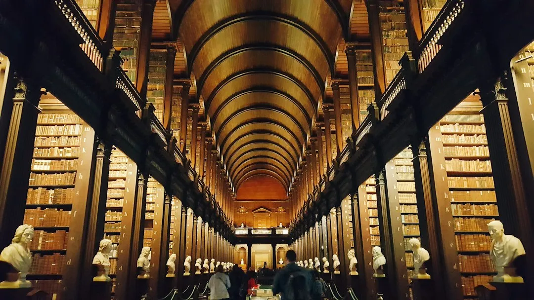 1. Trinity College Library, Dublin, Ireland - The Long Room That Stopped Time (Image Credits: Unsplash)
