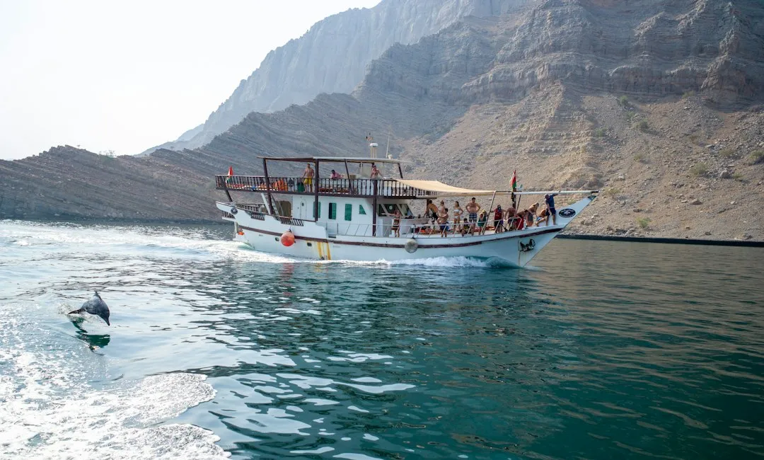 Exploring the Musandam Fjords by Dhow (Image Credits: Unsplash)
