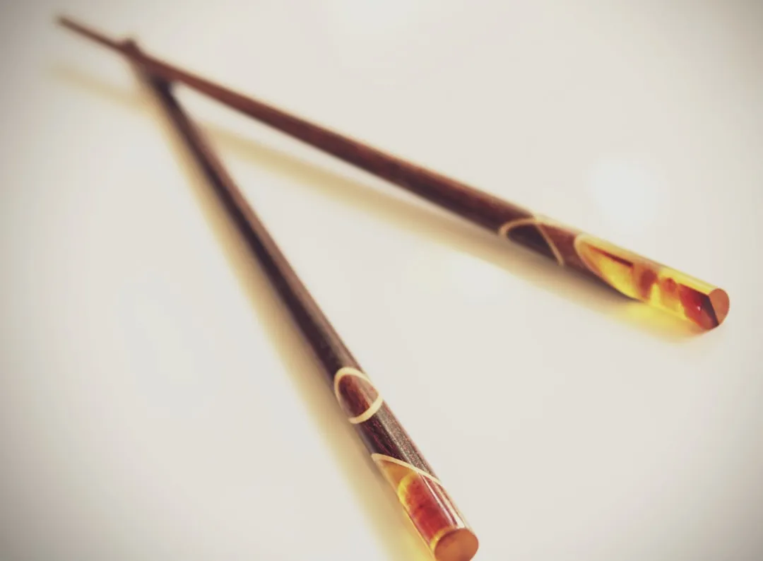 2. Sticking Chopsticks Upright in Your Rice (Image Credits: Unsplash)