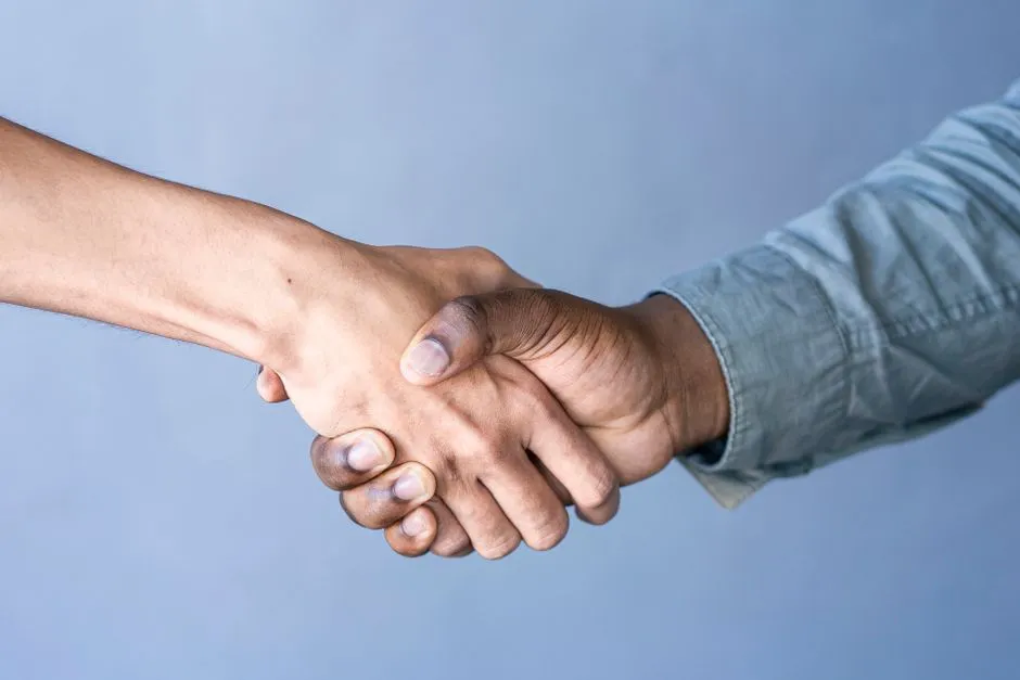 South Korea: Both Hands, and a Slight Bow (Image Credits: Pexels)
