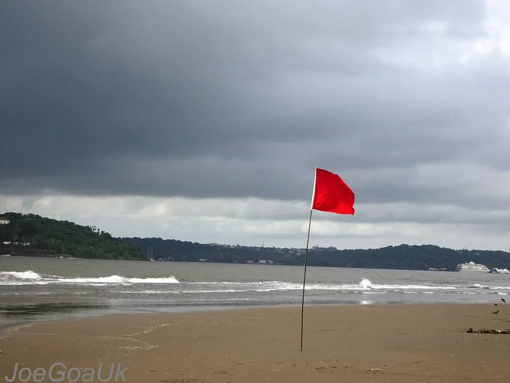 Swimming Past the Warning Flags (joegoauk73, Flickr, CC BY-SA 2.0)