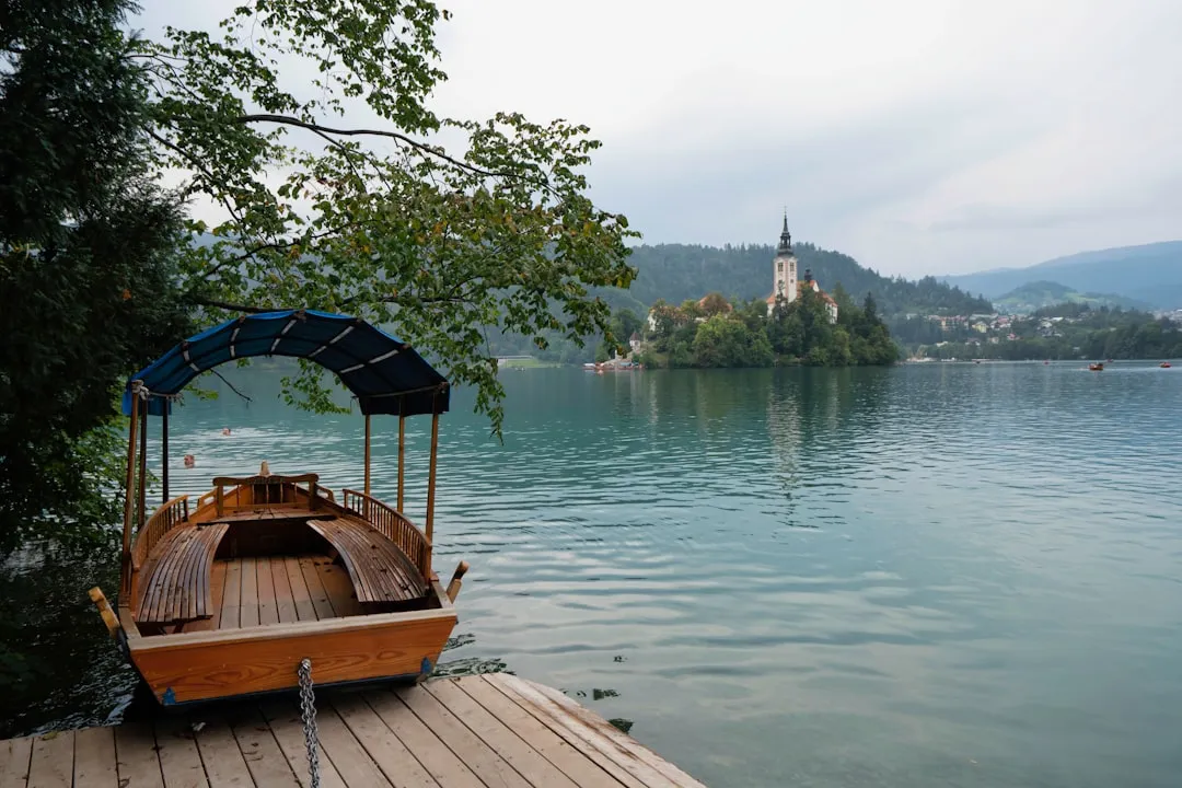 The Pletna Boat and Bled Island: Slow Travel at Its Purest (Image Credits: Unsplash)