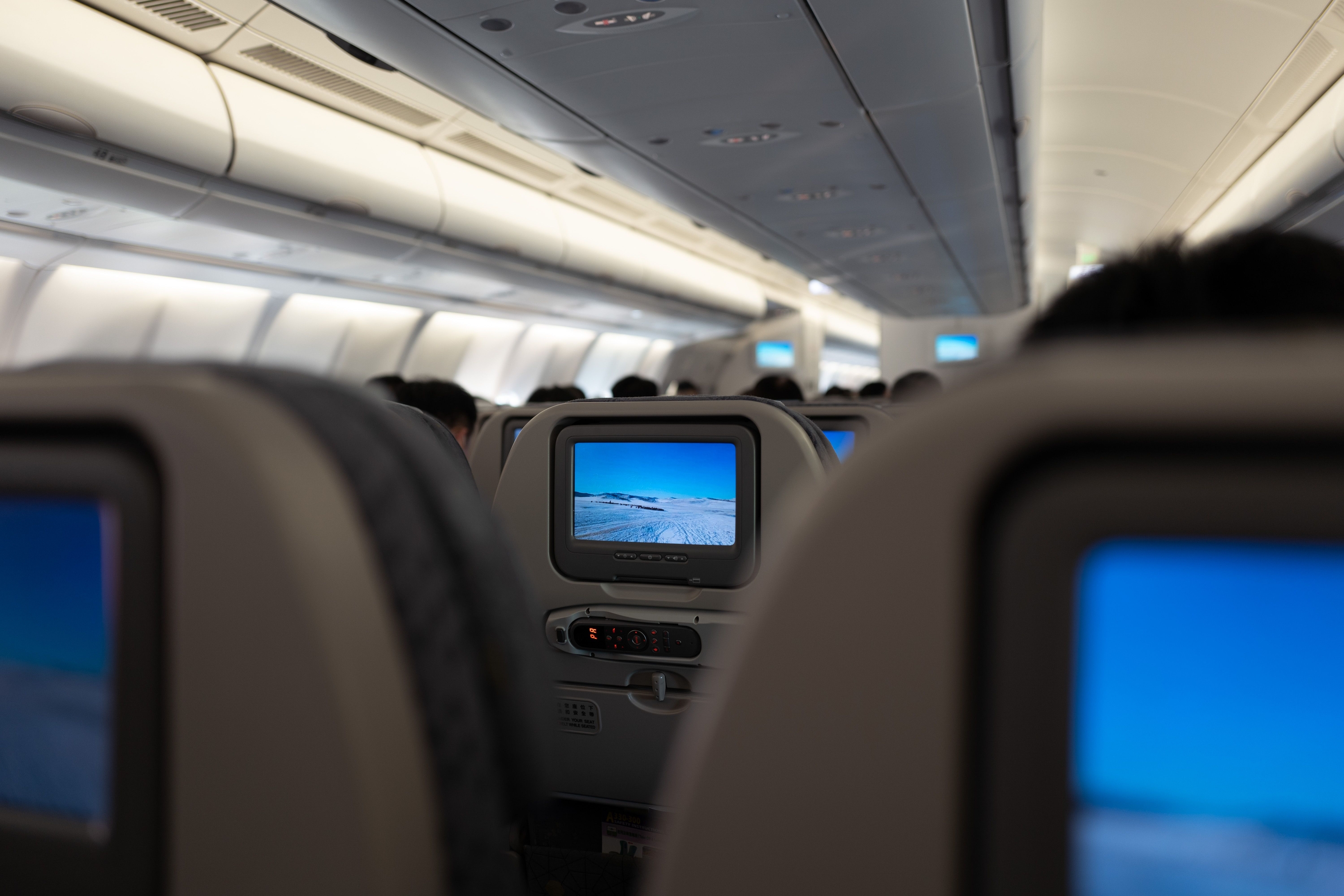 What Your Go-To Flight Entertainment Choice Says About Your Mood Right Now