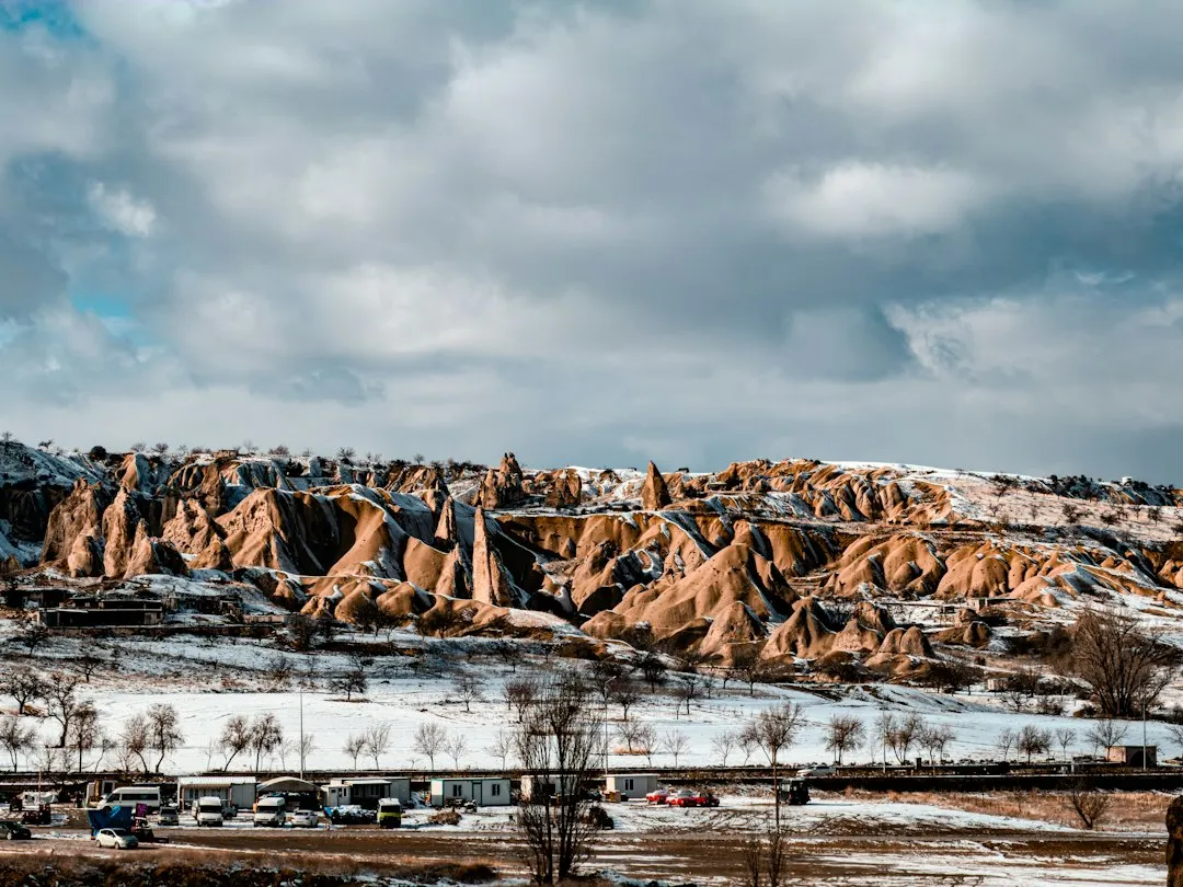 2. Cappadocia, Türkiye in Winter: Stone Spires Beneath Snow (Image Credits: Unsplash)