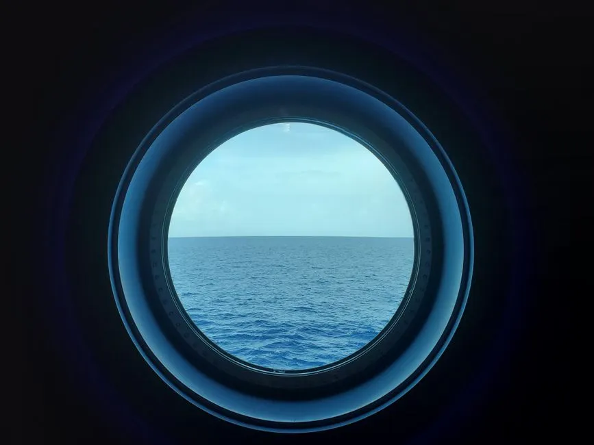Through Porthole Windows and Large Interior Windows (Image Credits: Pexels)