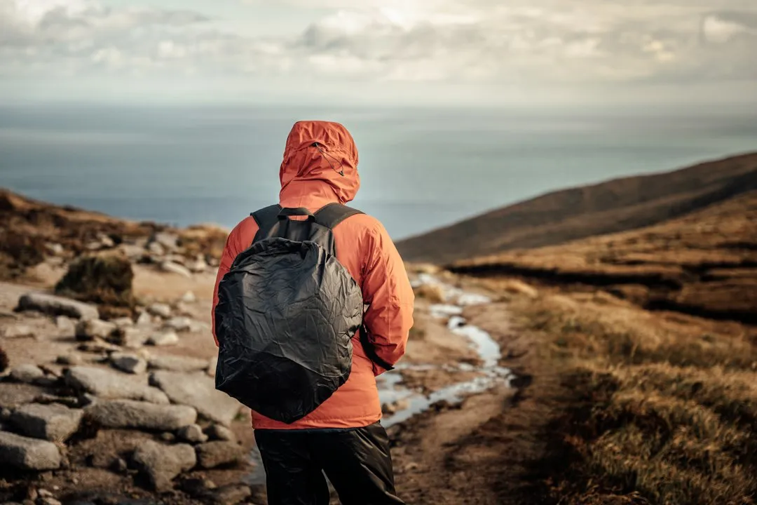 A Compact Daypack with a Rain Cover (Image Credits: Unsplash)
