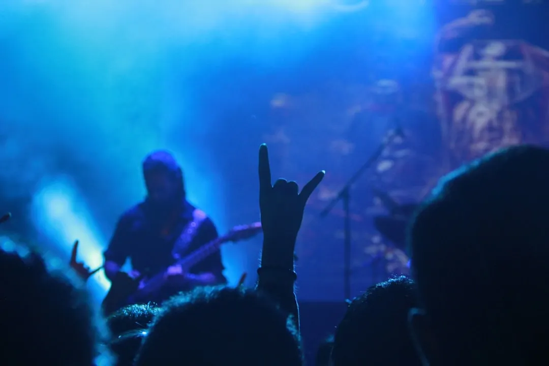 The Devil Horns: Rock On - or Relationship Scandal (Image Credits: Unsplash)