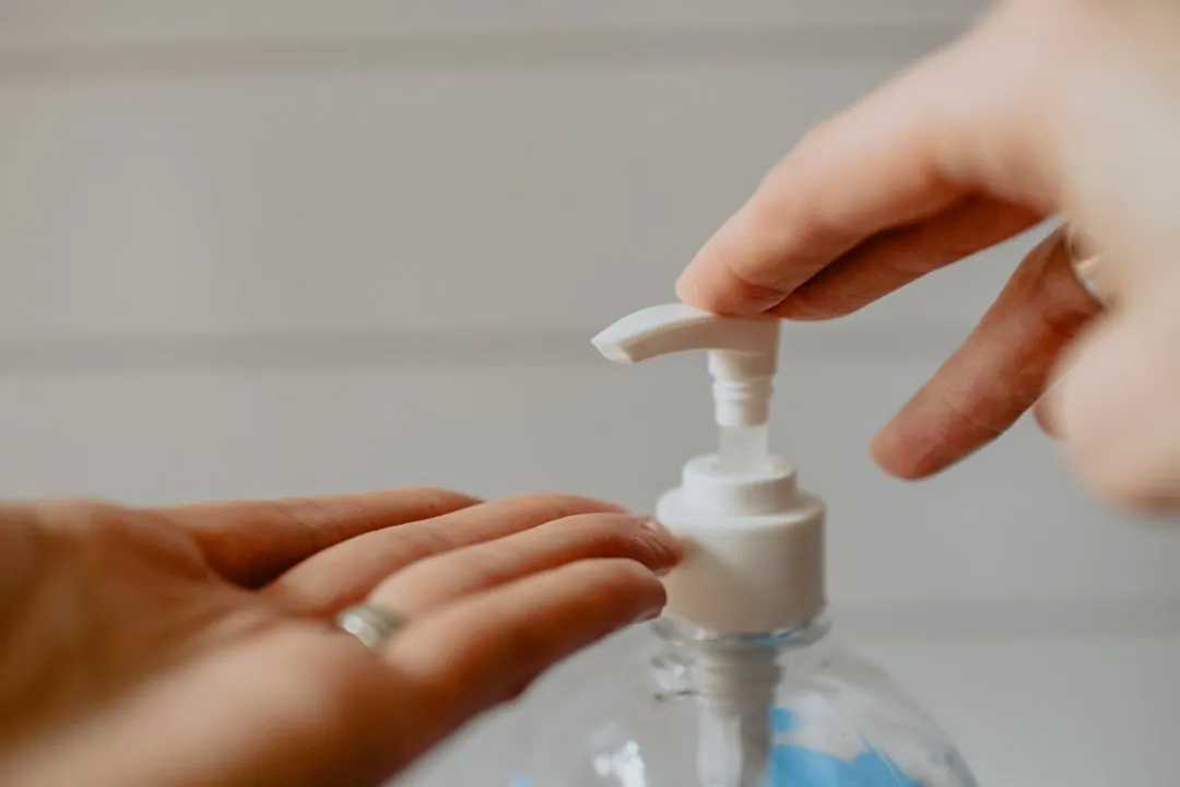 1. Hand Sanitizer: A Non-Negotiable First Line of Defense (Image Credits: Unsplash)