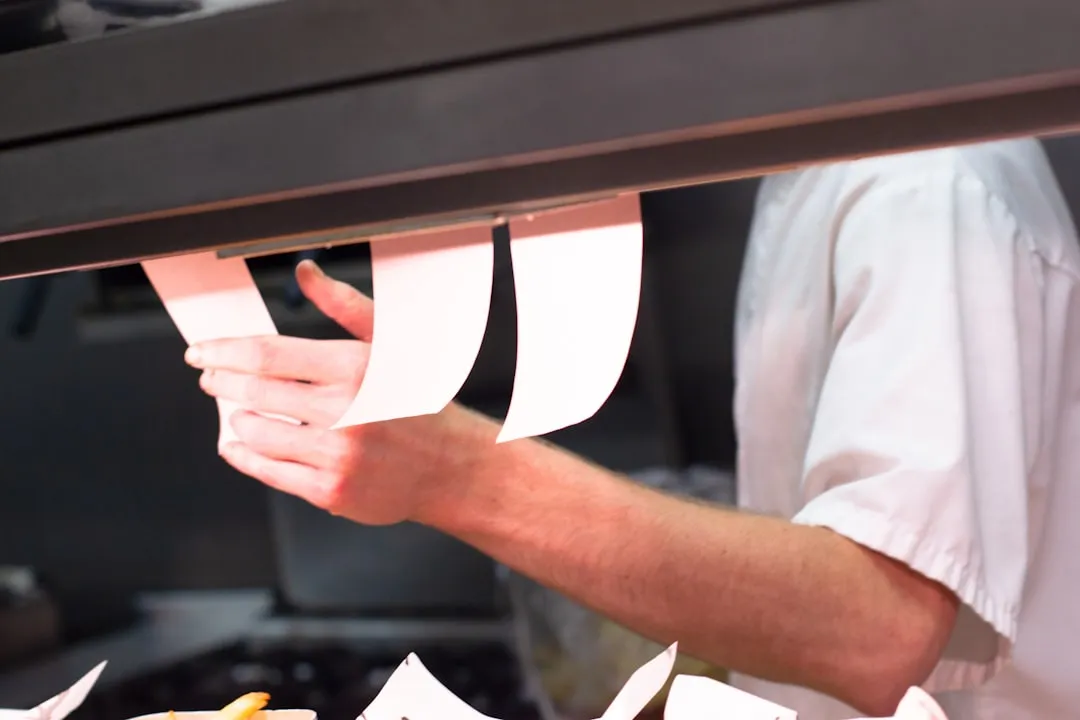 5. Double-Tipping When a Service Charge Is Already Included (Image Credits: Unsplash)
