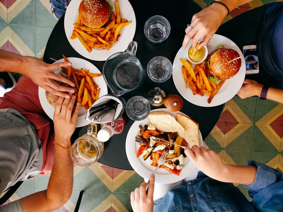 They Read the Room Before They Order (Image Credits: Unsplash)