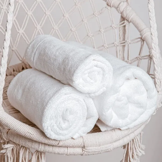 Draping a Towel Over a Chair Before Dawn (Image Credits: Pexels)