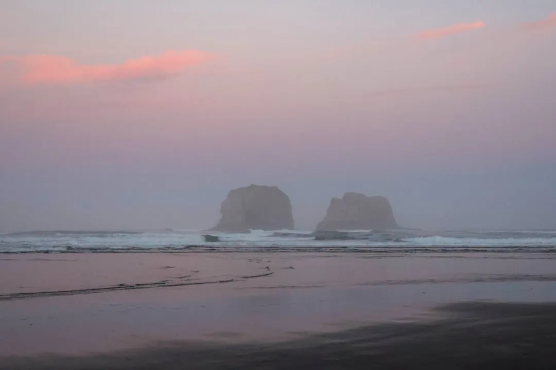 Twin Rocks: The Beach's Signature Backdrop (Image Credits: Unsplash)