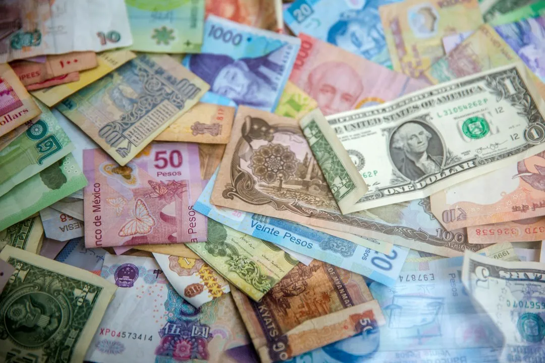 Currency Confusion Makes Overspending Invisible (Image Credits: Unsplash)