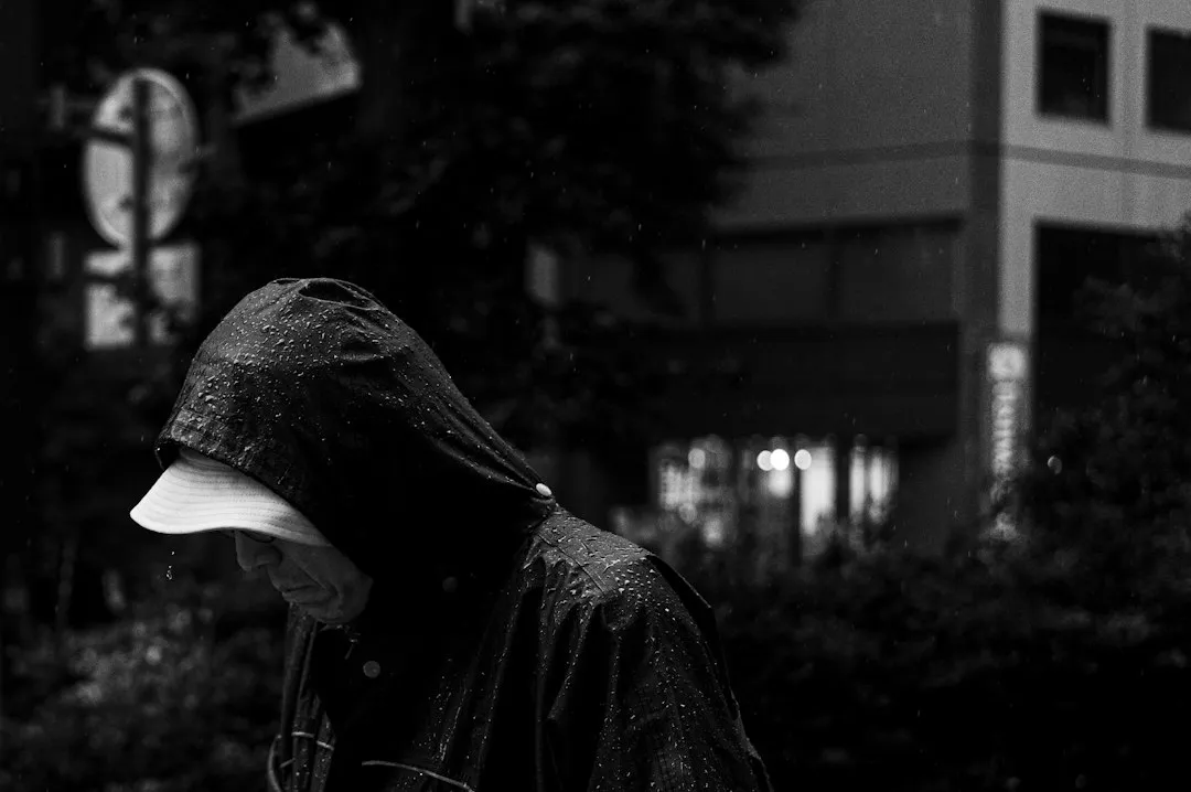 The Hooded Rain Shell: The True Local Uniform (Image Credits: Unsplash)