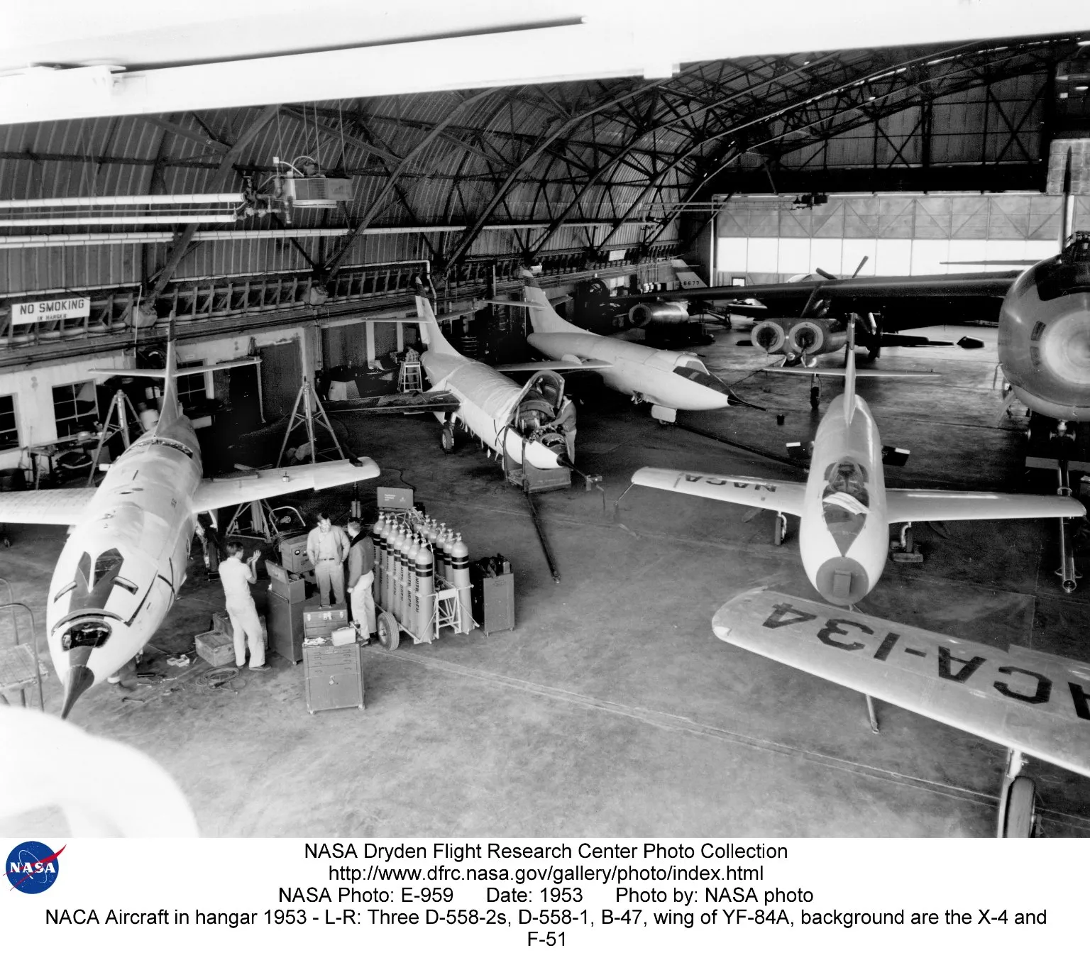 The Takeaway (NACA Aircraft in hangar 1953: L-R: Three D-558-2s, D-558-1, B-47, wing of YF-84A, No restrictions)