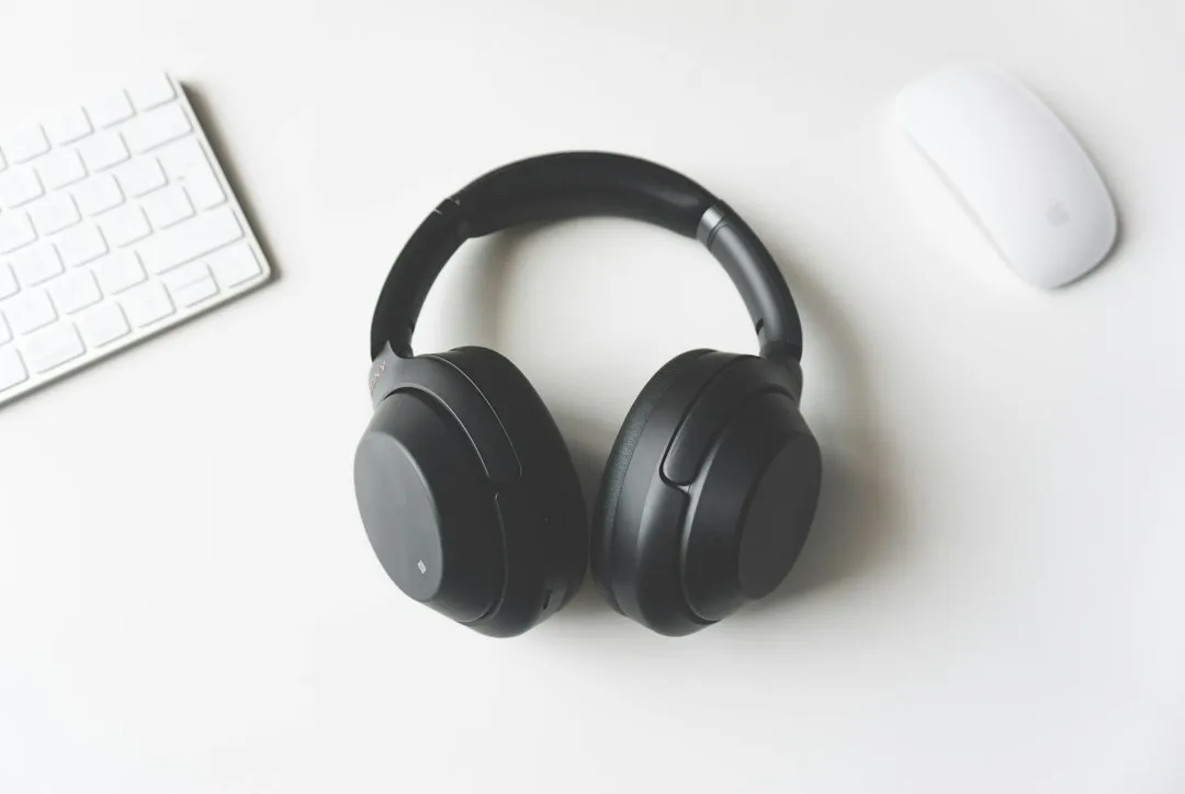 1. Noise-Cancelling Headphones: Your Portable Quiet Zone (Image Credits: Unsplash)