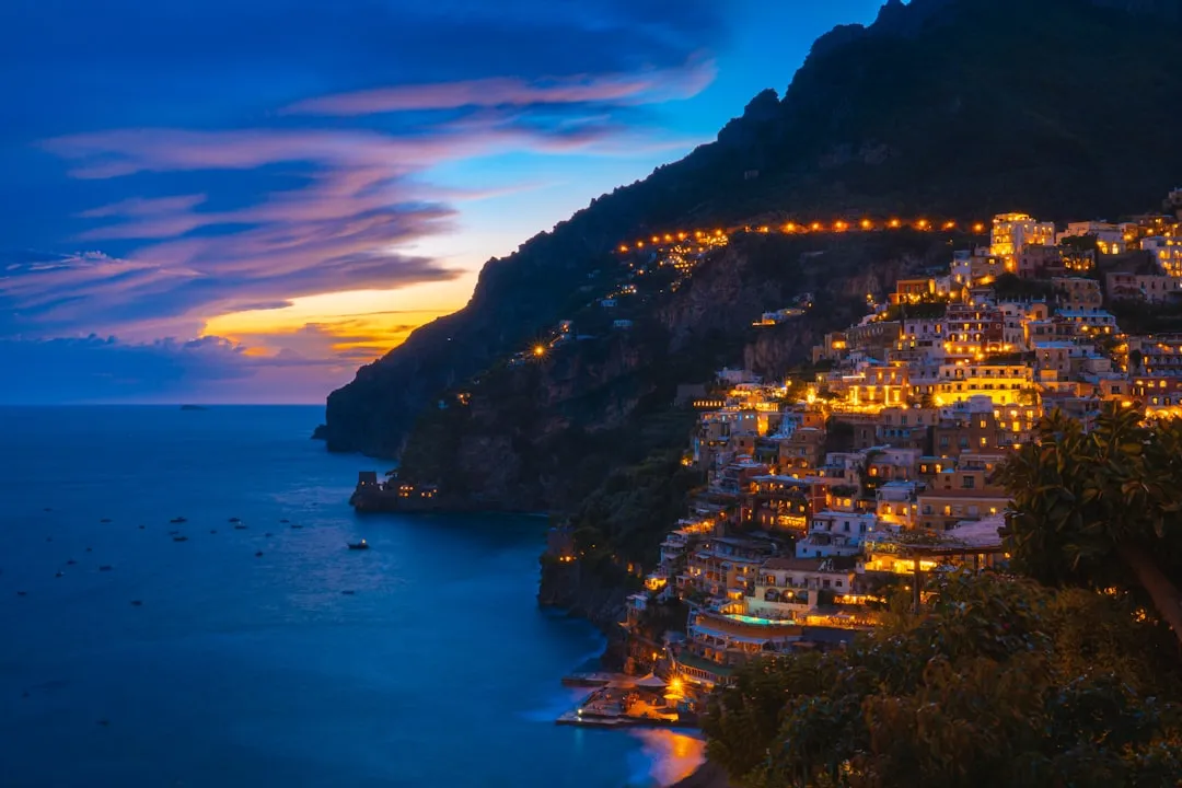 The Illuminated Positano Experience After Sunset (Image Credits: Unsplash)